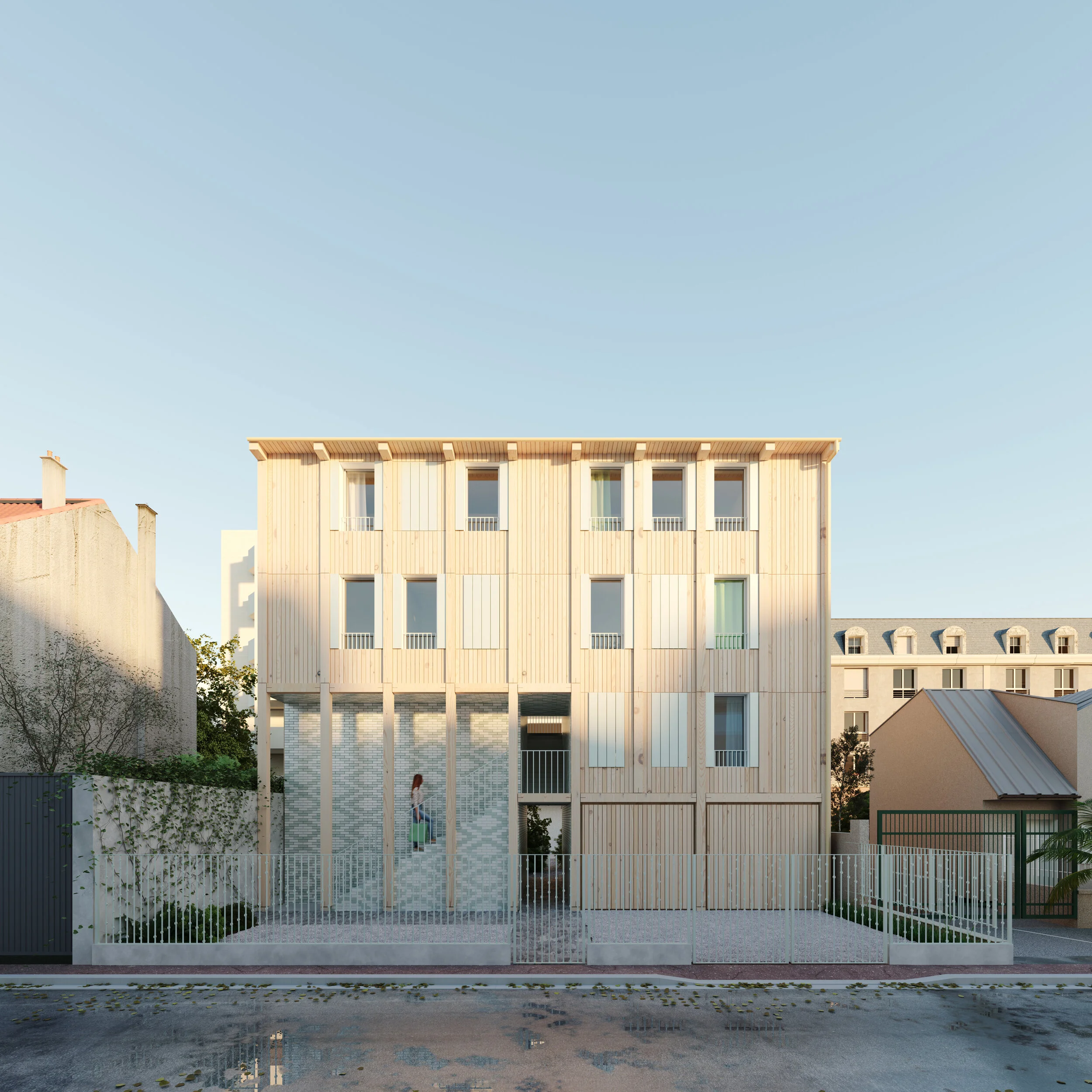 Second bâtiment sur ruelle — quatre étages, structure légère et revêtement bois en réponse à l'échelle de la voie
